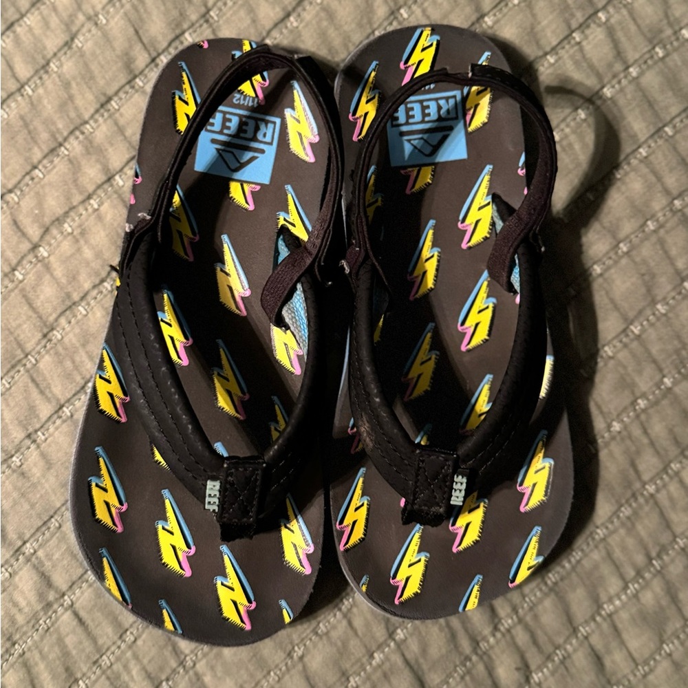 Reef Boys’ Little Ahi Sandals w/ Lightening Bolt Design (11/12 Toddler)